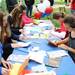 Children write and decorate cards for active duty military at Glacier Highlands Park following the Memorial Day Parade on Monday, May 27. Ben Freed I AnnArbor.com